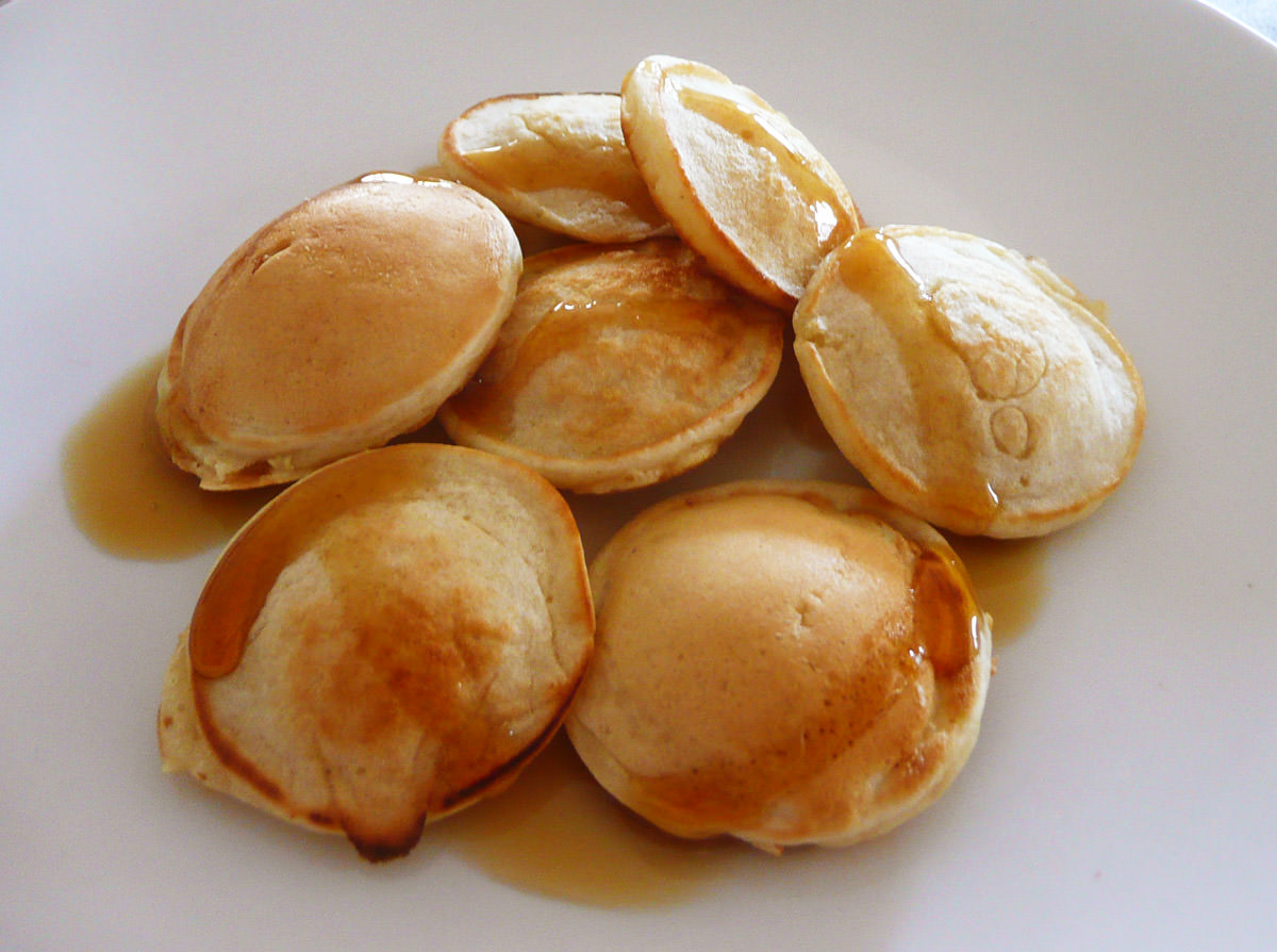 Poffertjes with maple syrup
