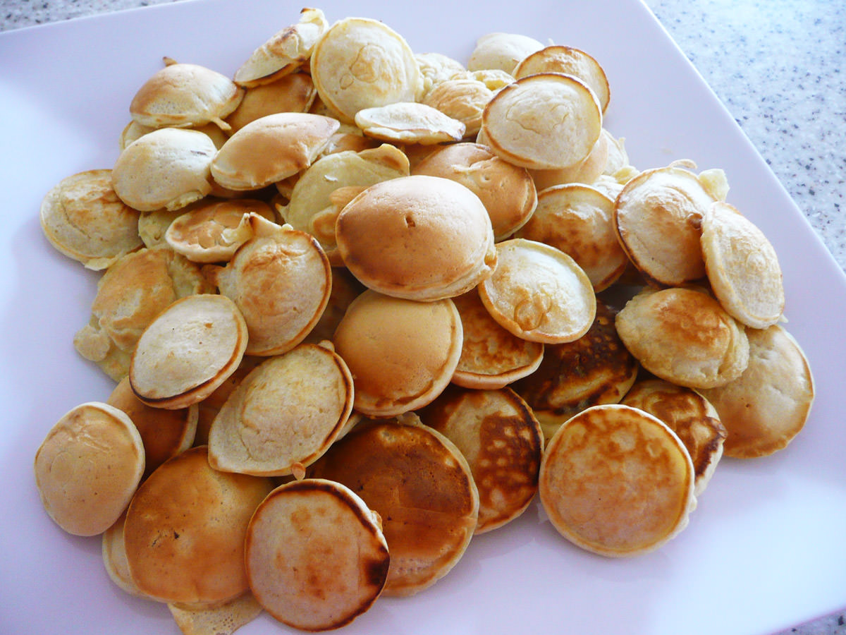Platter of poffertjes (Dutch mini pancakes)