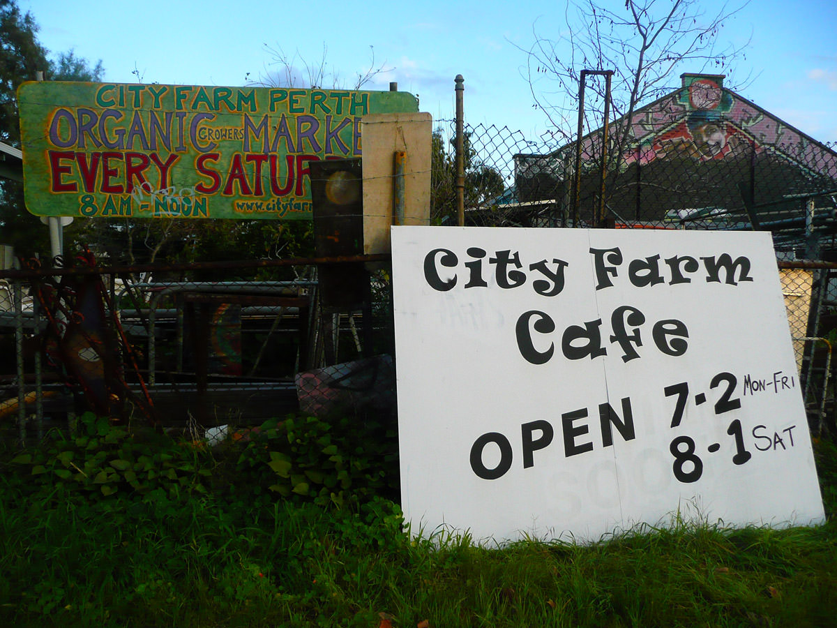 City Farm Cafe sign - opening hours 7am -2pm Mon - Fri, 8am - 1pm Sat