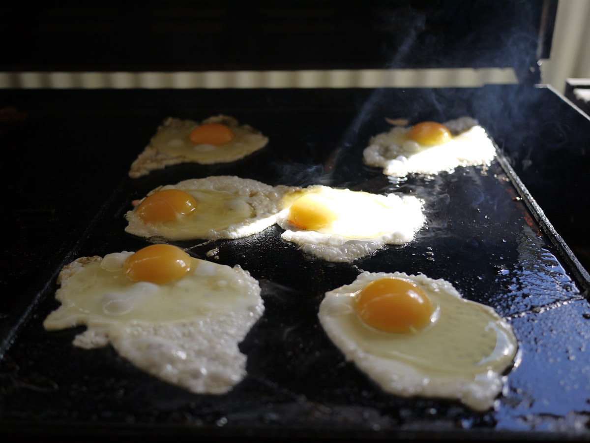 Eggs frying on the barbecue
