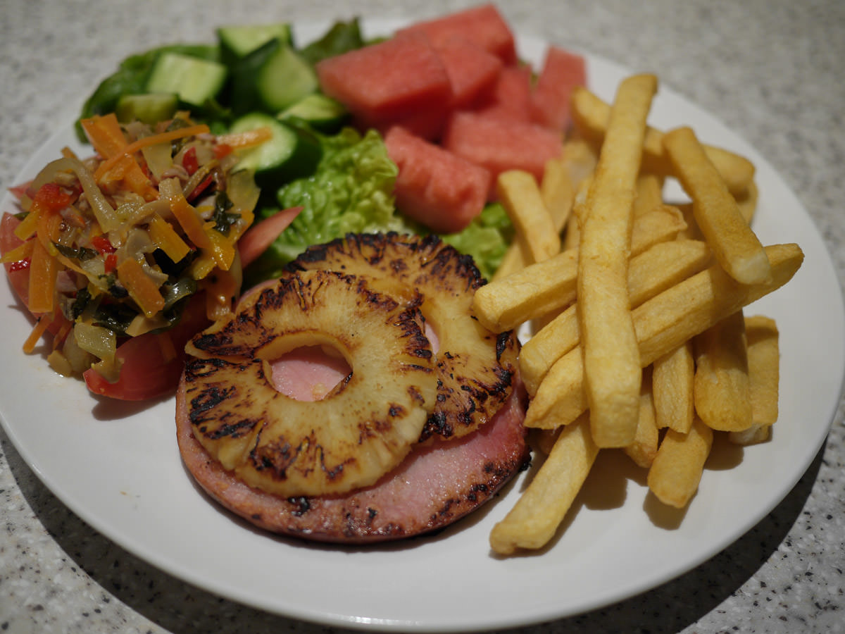 Ham steak and pineapple, oven fries, vegetables, cucumber and watermelon