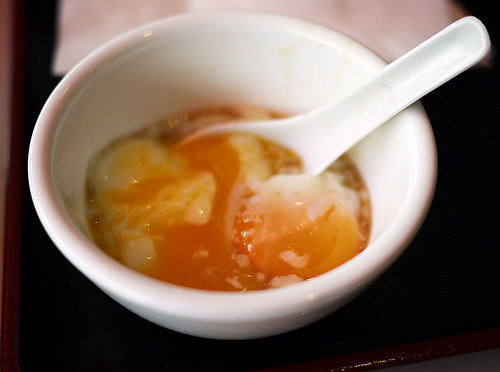 Soft-boiled egg with soy and white pepper