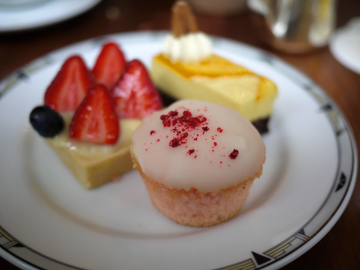 Rose cupcake, orange cheesecake, strawberry & custard tart