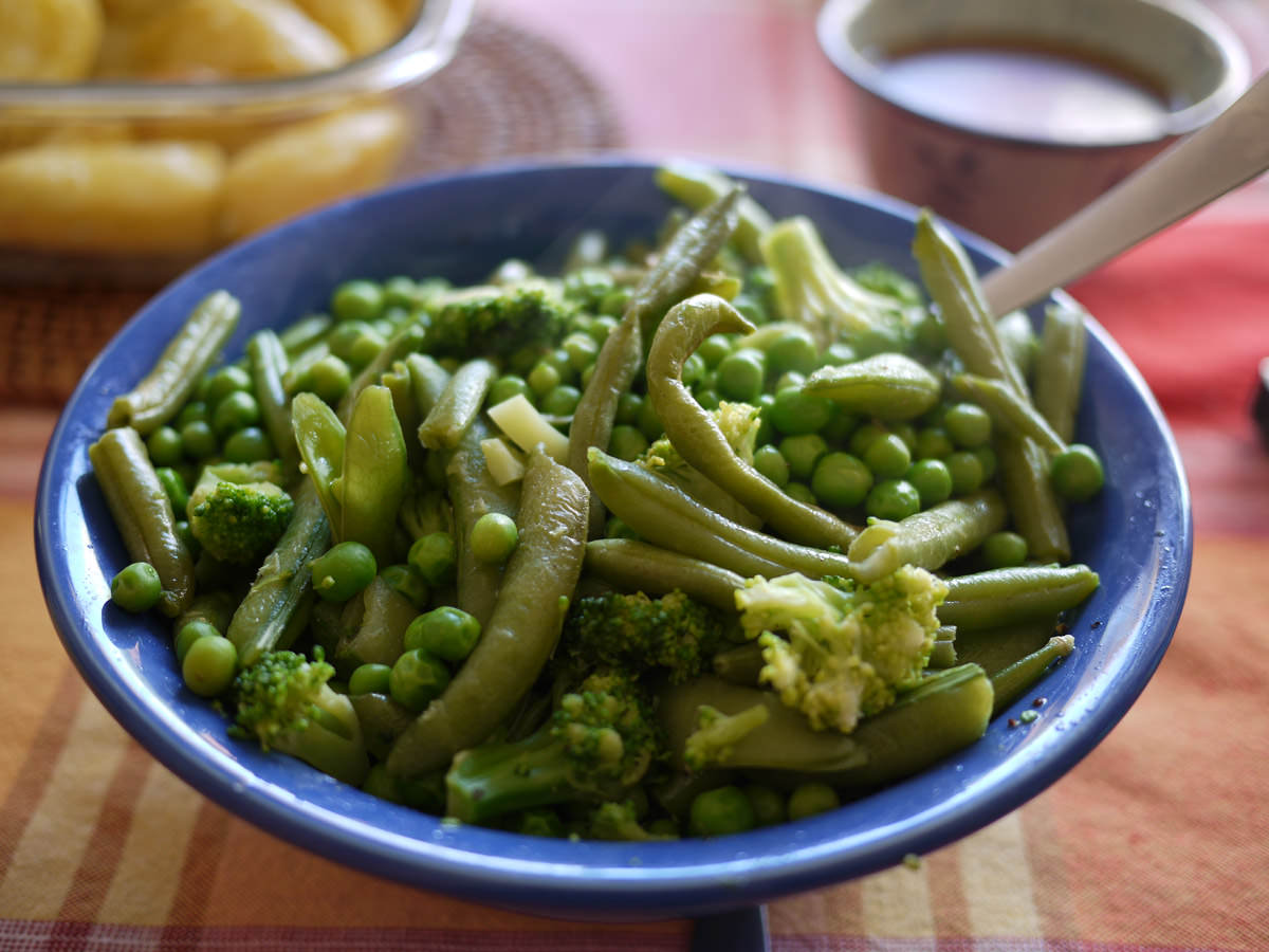 Steamed green vegetables - peas, beans and broccoli