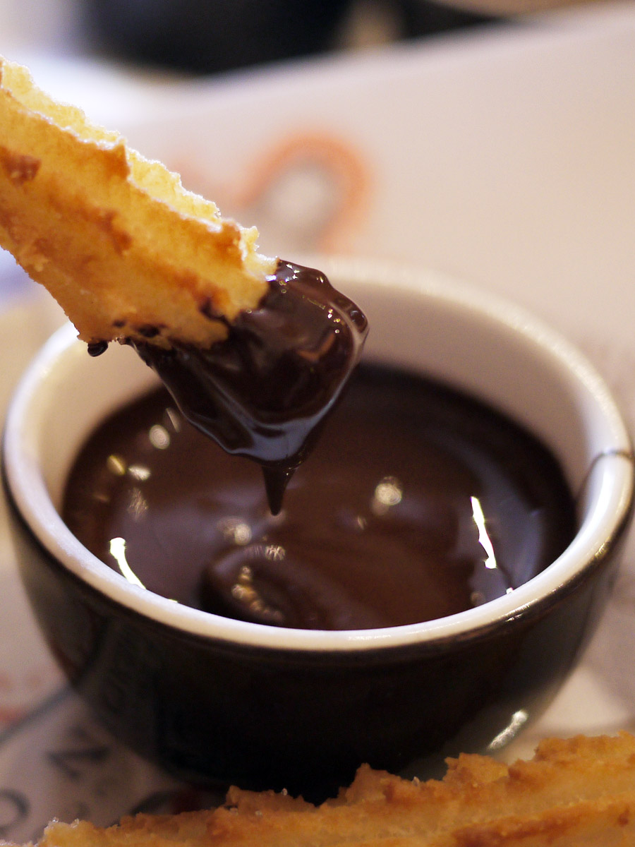 Churros with dark chocolate dipping sauce