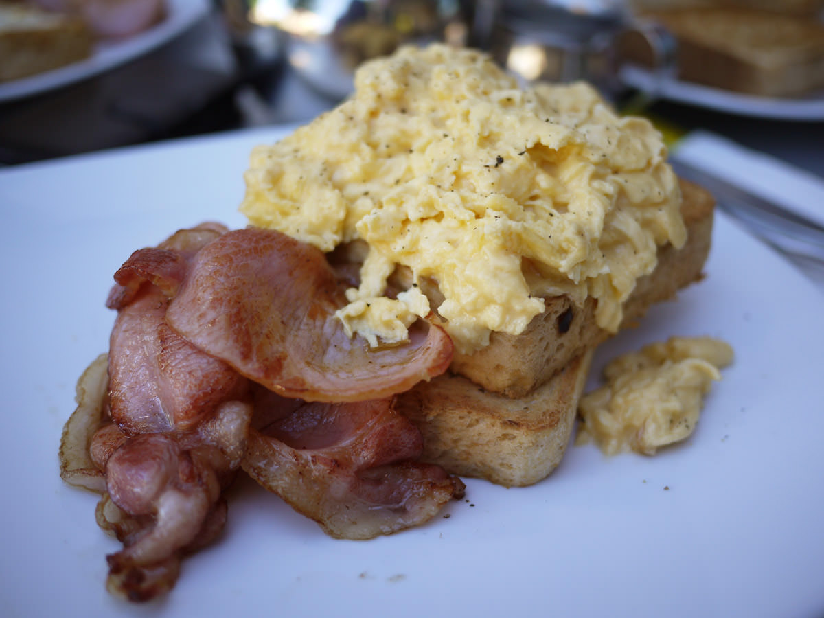 Scrambled eggs on toast with bacon (AU$14)