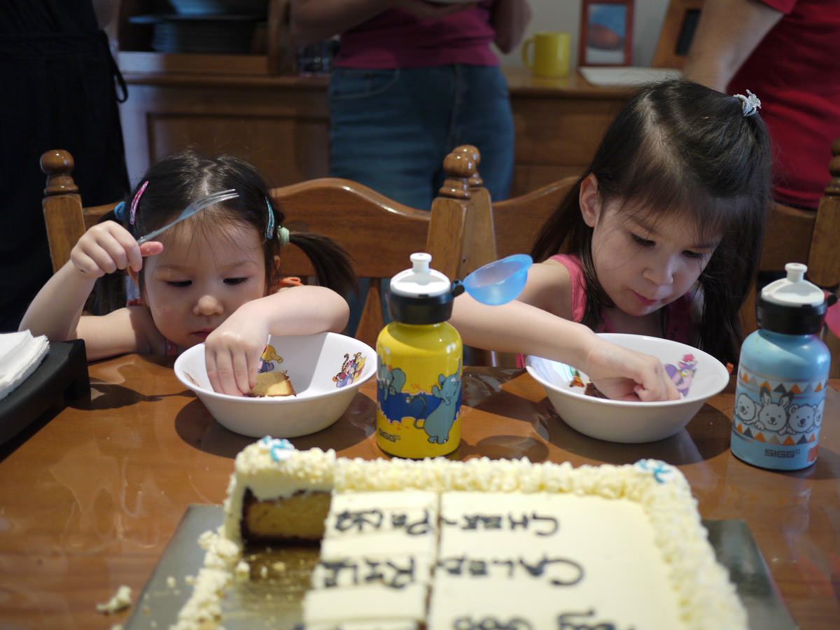The girls eat cake