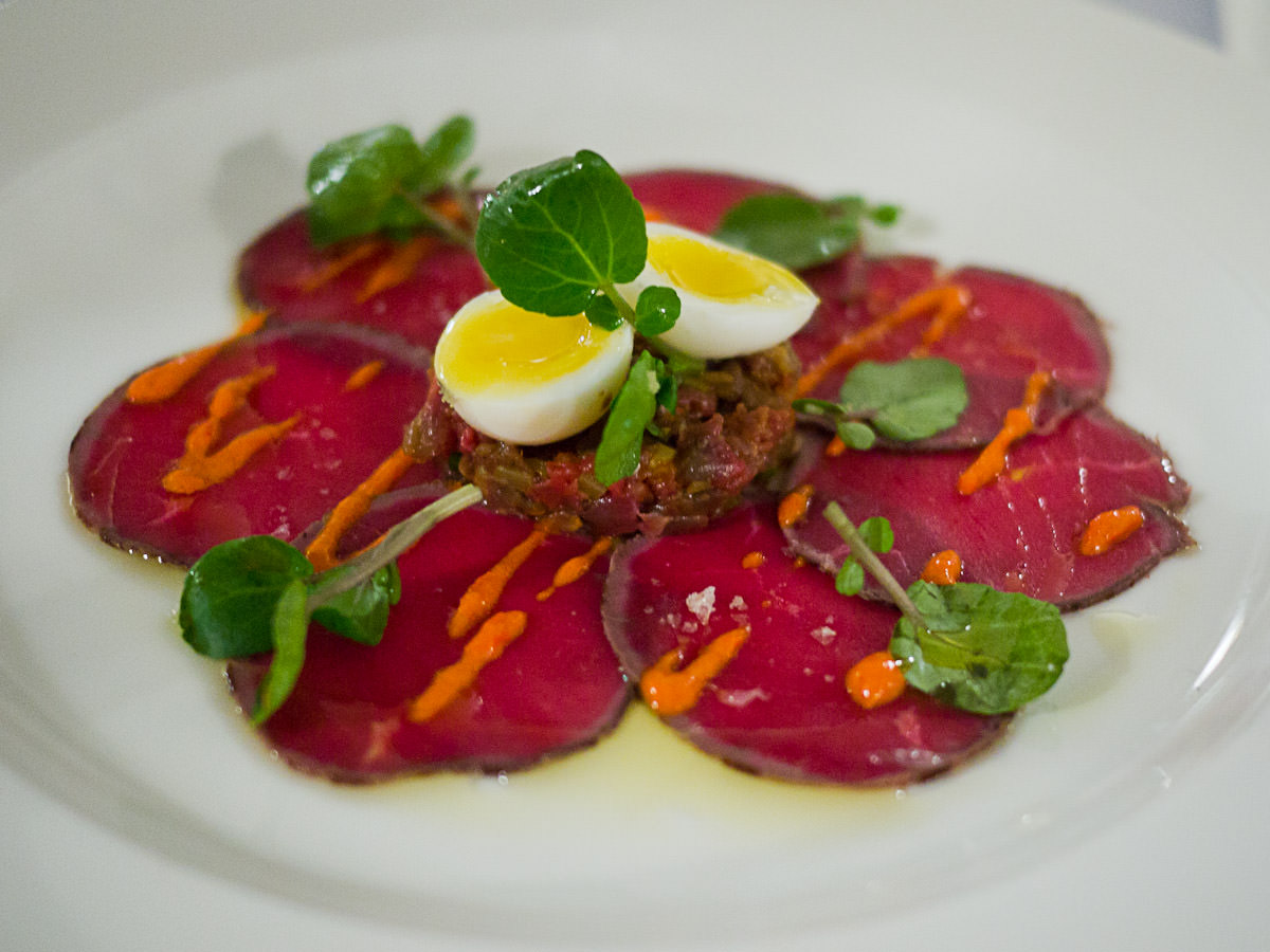 Carpaccio of beef, beef tartare, quail egg, mojo picante (spicy red pepper sauce), watercress (AU$18)