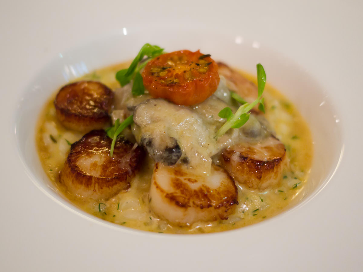 Scallops seared St Jacques, tomato and herb risotto