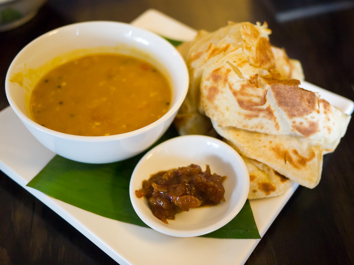 Roti canai with dhal and sambal