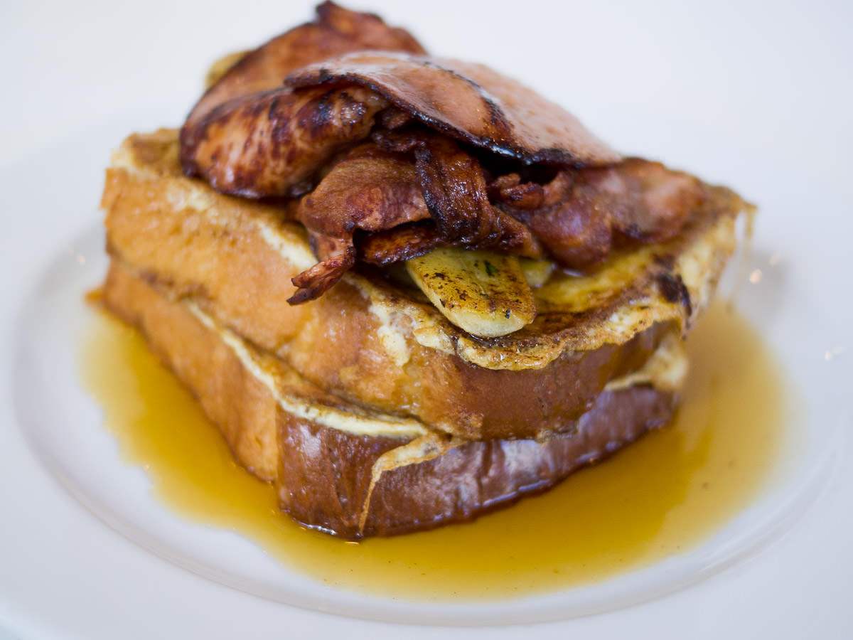 French toast of brioche with caramelised banana, bacon and maple syrup (AU$18)