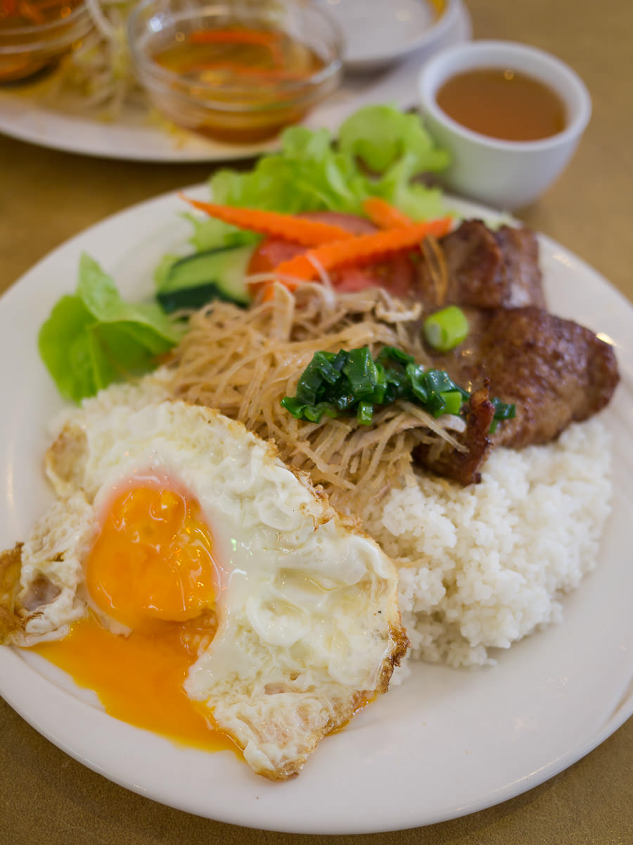 Broken rice with pork chop, shredded pork and fried egg (AU$10)
