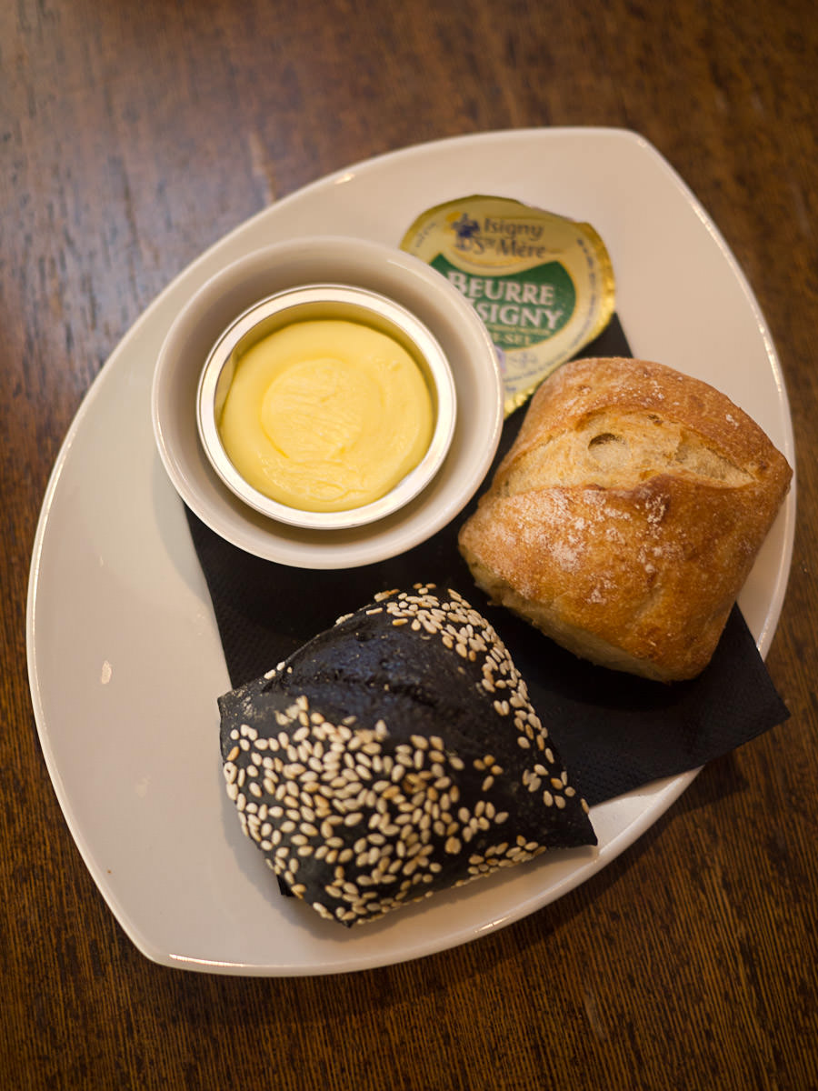 Squid ink and caramelised onion bread with French butter