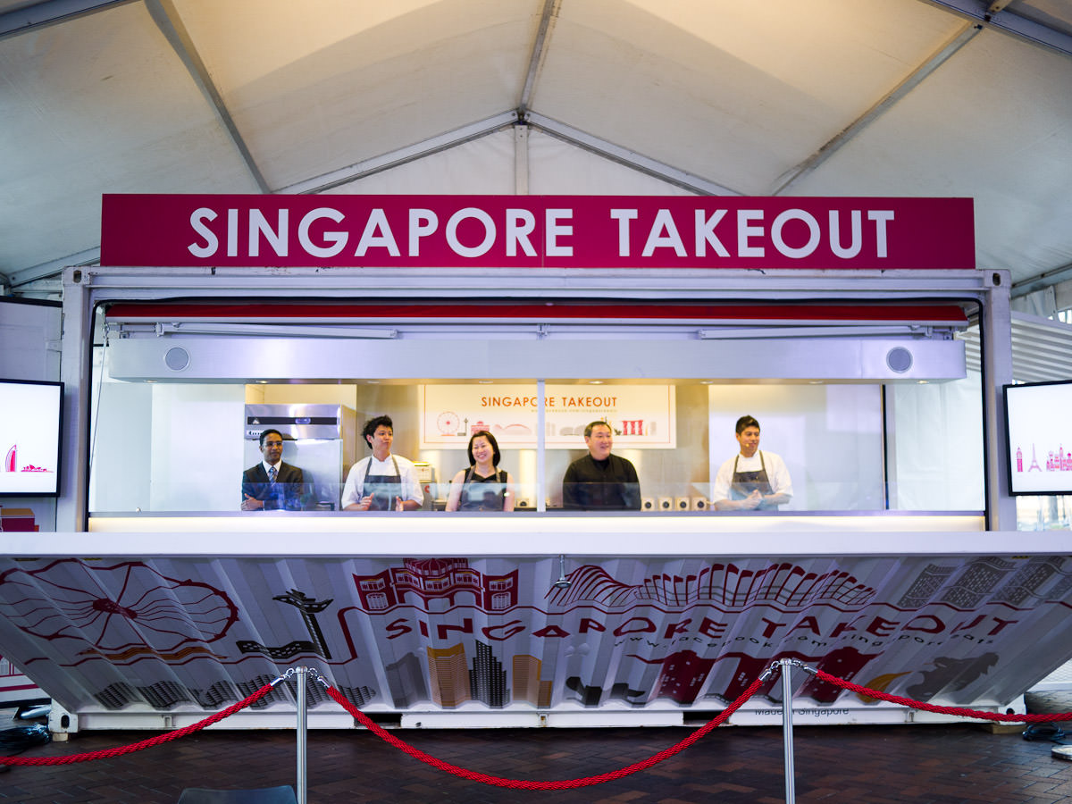 The sea container opens to reveal the Singapore Takeout crew