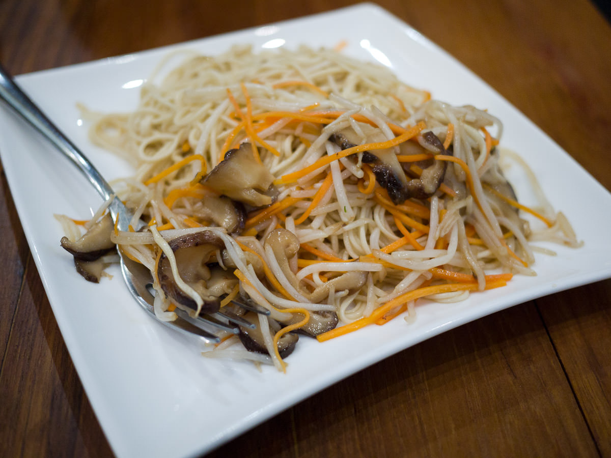 Handmade noodles wok-fried with mushrooms, beansprouts in premium soya sauce (AU$12.90)