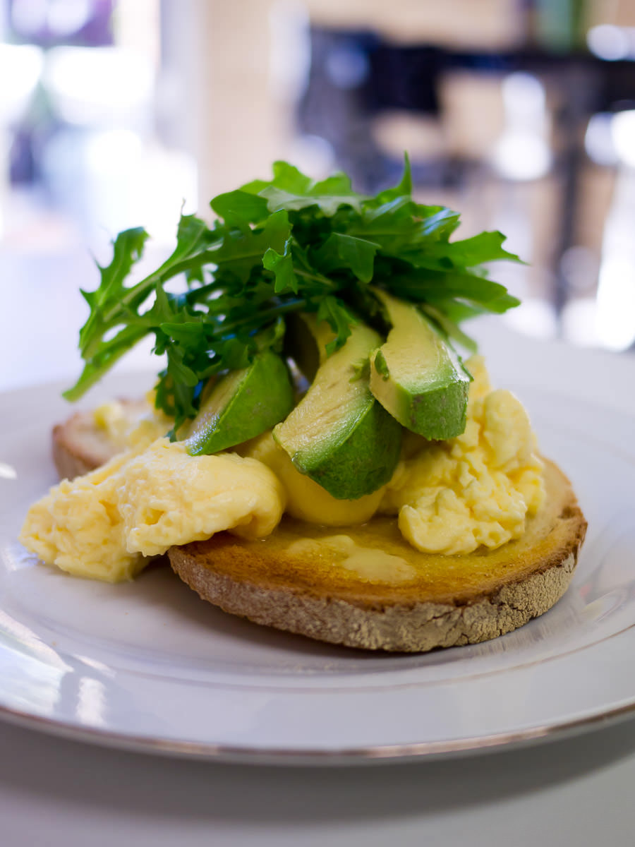 Scrambled eggs and avocado with toast