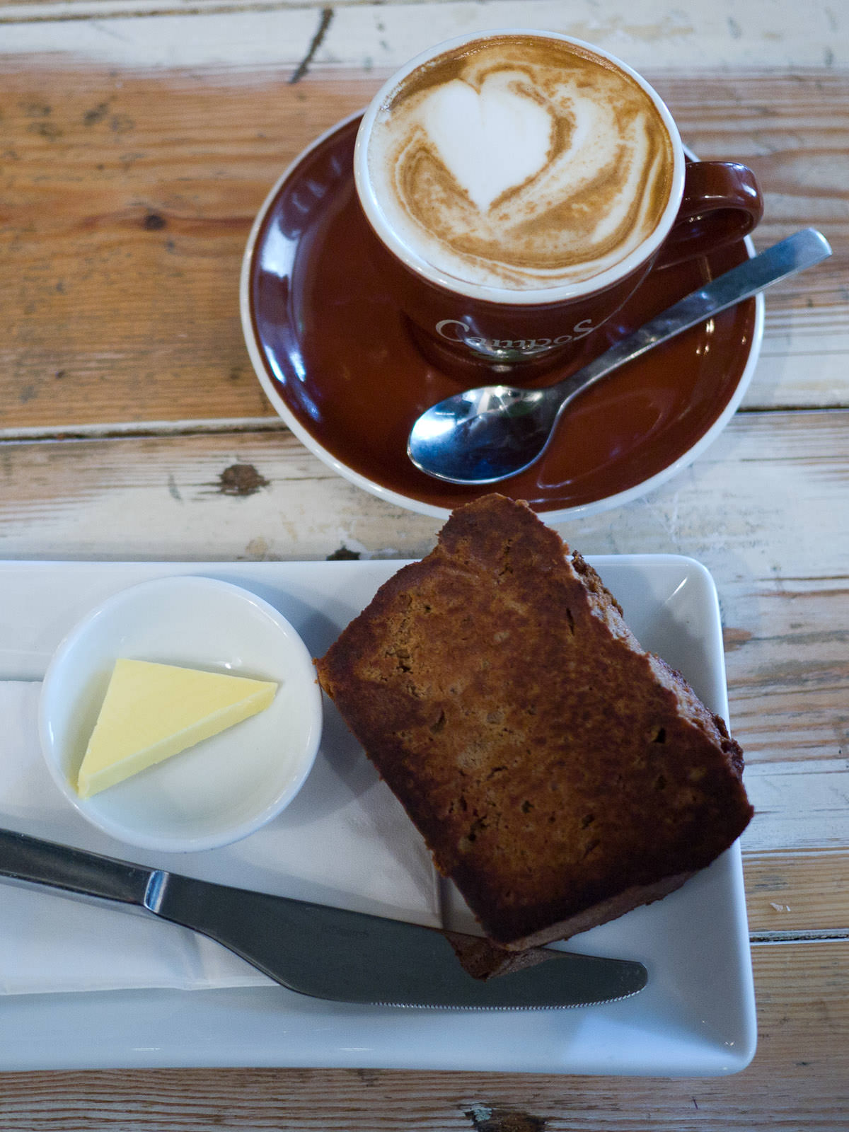 Banana bread with butter and my second soy flat white