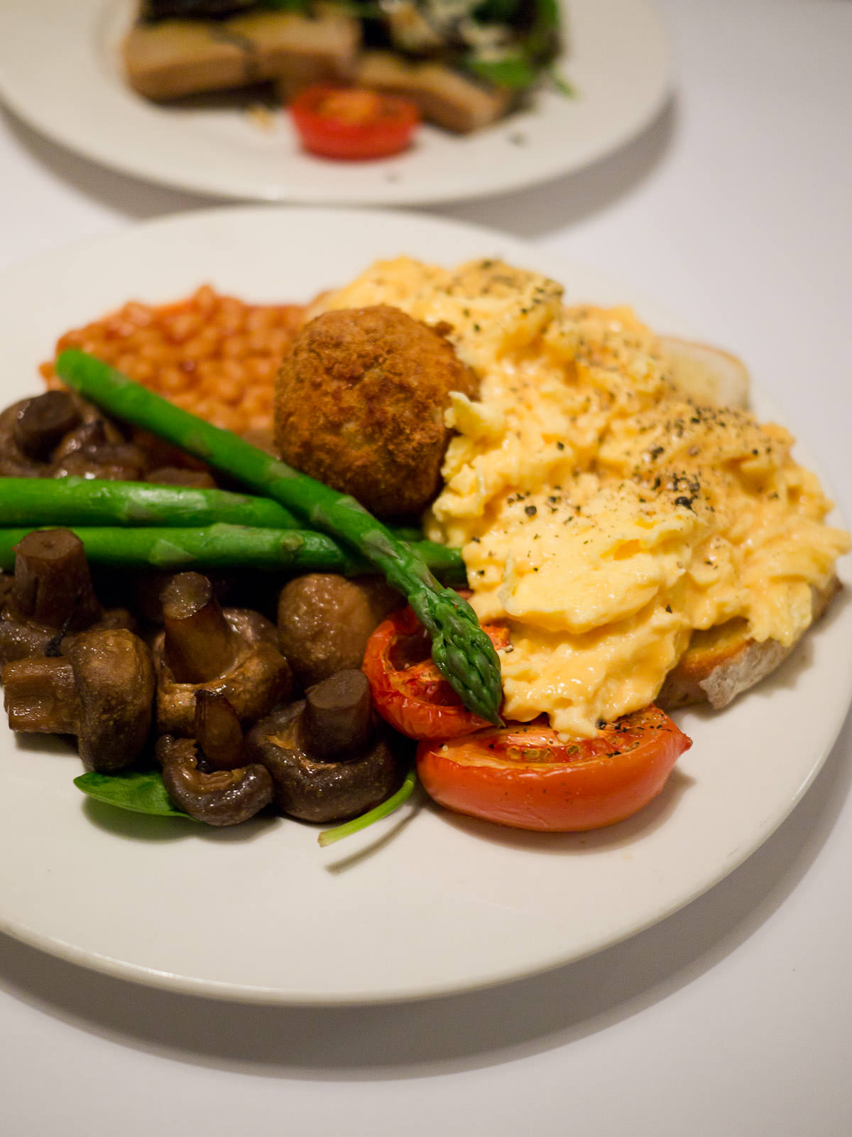 Vegetarian full breakfast - eggs, potato, tomato, baked beans, asparagus, spinach, mushrooms (AU$19.50)
