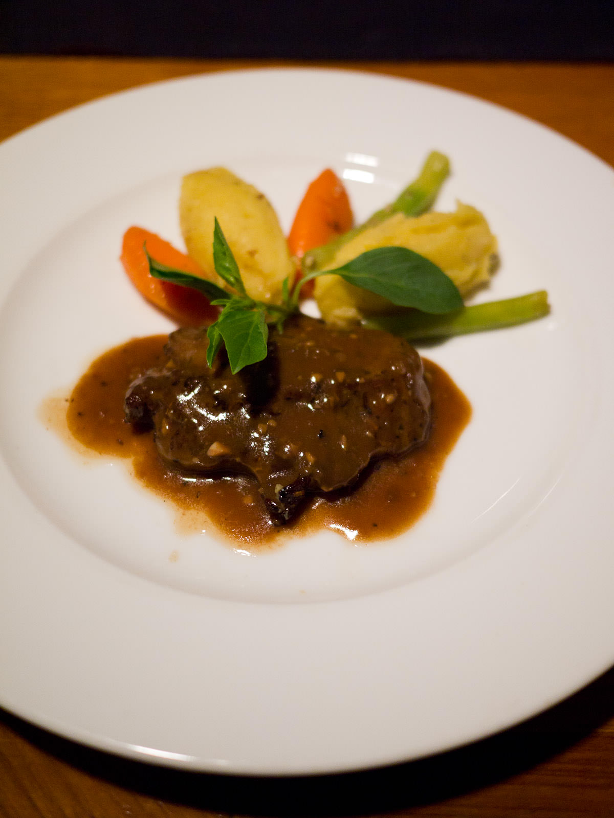 Ostrich with Kampot pepper sauce with potato mash and vegetables