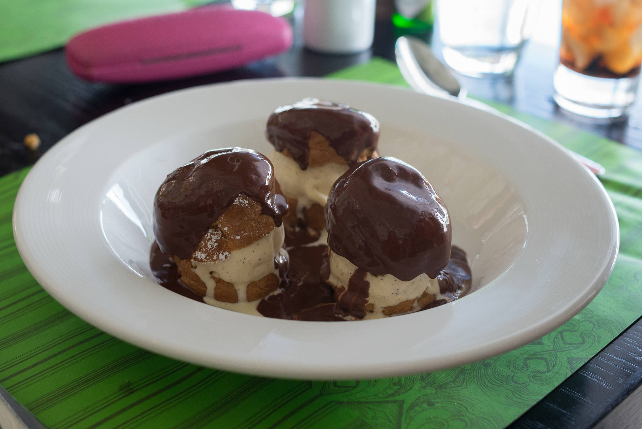 Profiteroles with vanilla bean ice cream and warm chocolate sauce (AU$18)