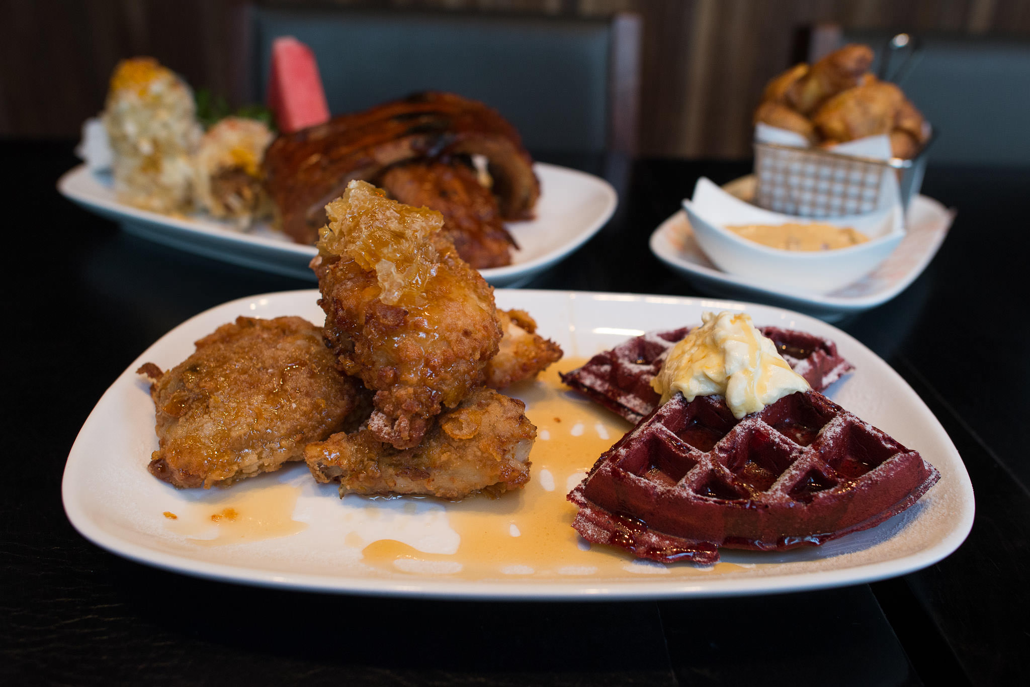 Fried chicken and red velvet waffles with Killer Bee honey (AU$28)