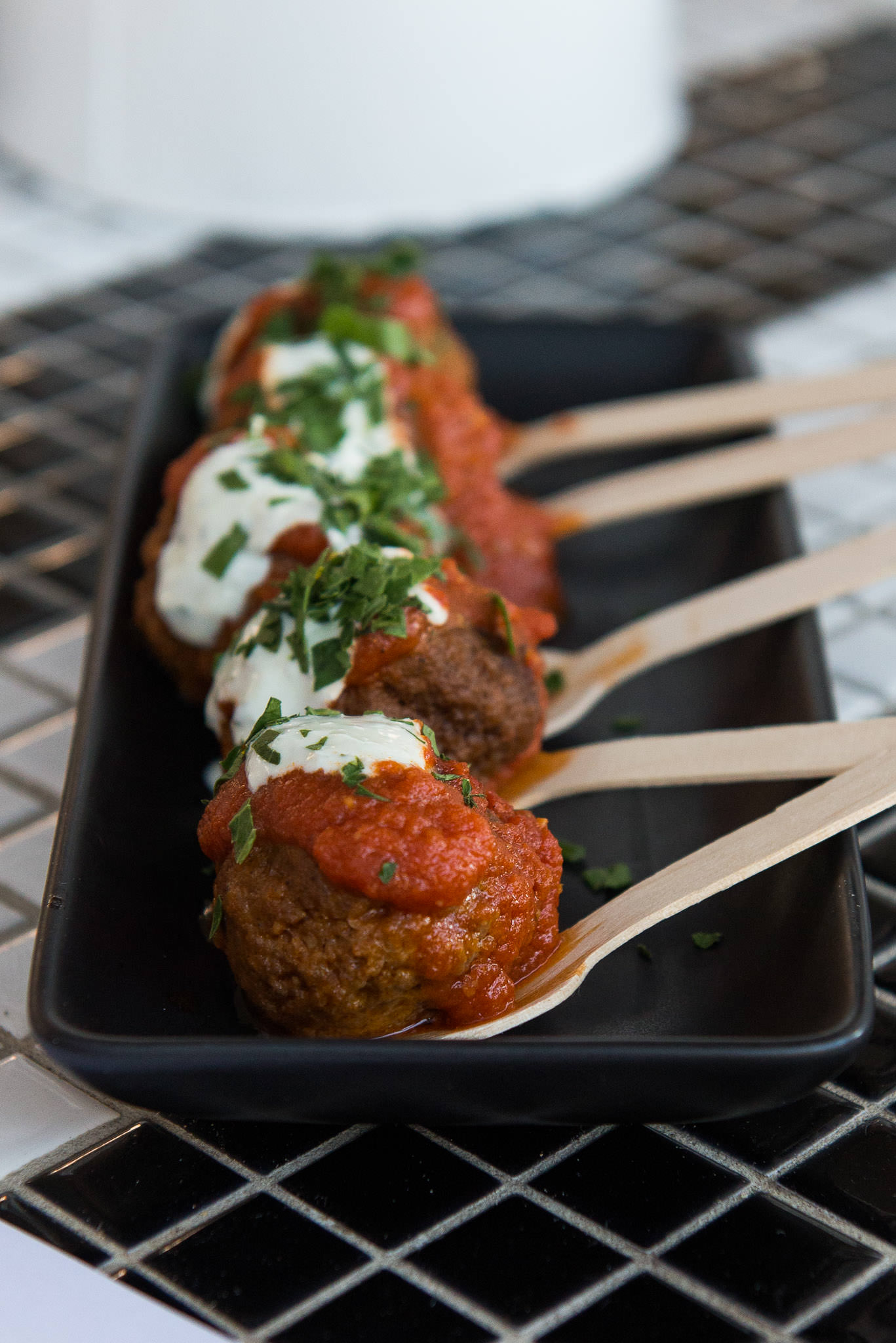 Spicy lamb meatballs with tomato sauce and yoghurt (AU$9)