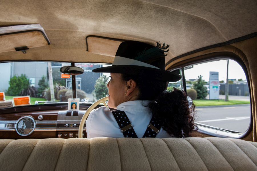 Riding in a vintage car with driver Tery