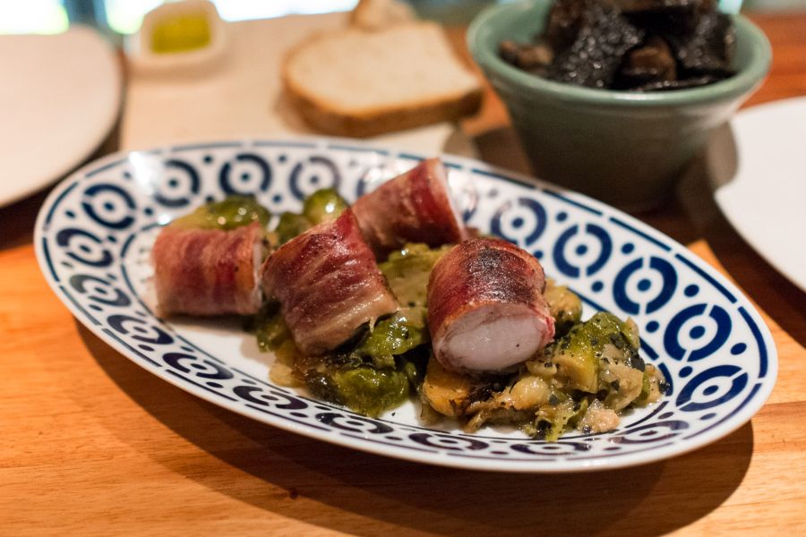 Special of the day - rabbit wrapped in pancetta with braised Brussels sprouts