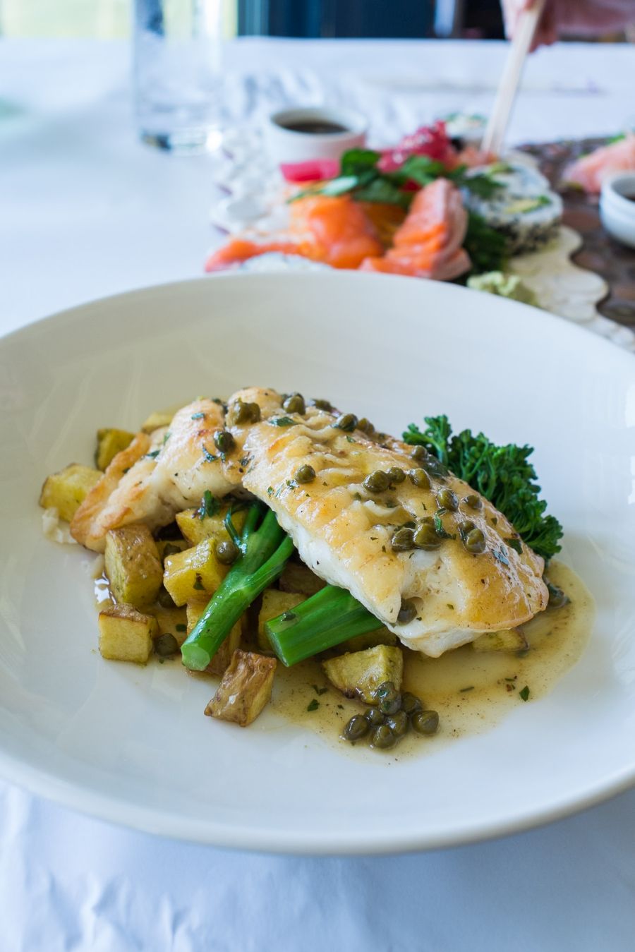 Fish special - groper gently  grilled, with broccolini and skillet potatoes with lemon caper sauce (AU$52)