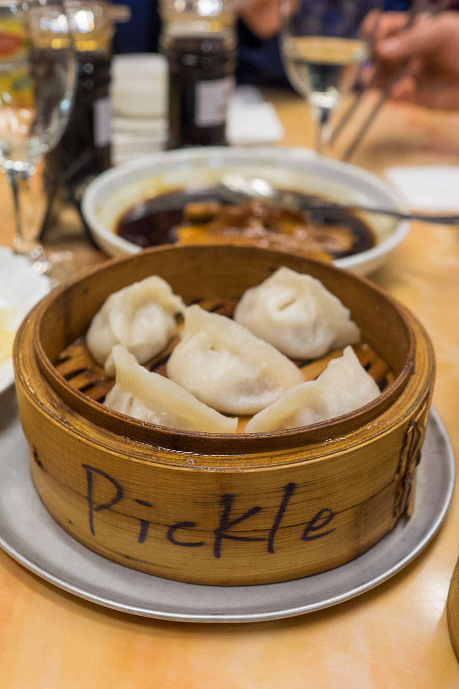 Pickled cabbage and pork steamed dumplings (small, AU$5.50)