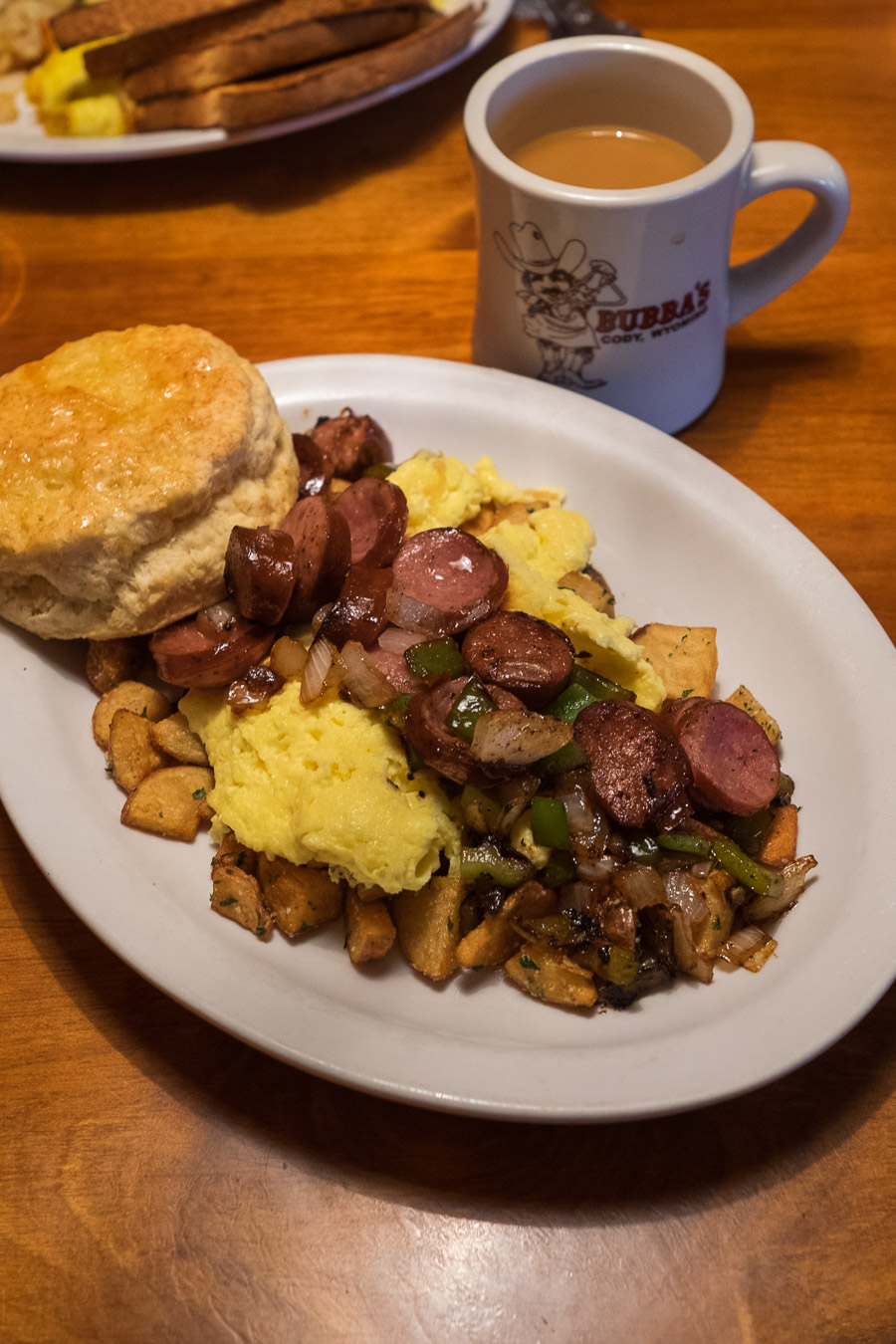 Smoked sausage scramble (US$9.99)  with a Bubba's biscuit.